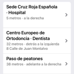 En la parte central se encuentra una lista de lugares ordenados por cercanía, más cercanos arriba. En la imagen se muestra en primer lugar la sede de cruz roja Española, después el centro europeo de ortodoncia y por último el paso de peatones a 38 metros