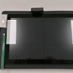 Image showing the tablet and its accessories.